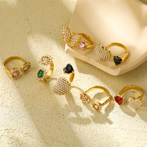 Double-layered gold titanium steel rings with cubic zirconia, butterflies and flowers