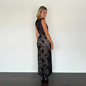 Detail of black sleeveless mesh dress featuring elegant flocked rose floral patterns