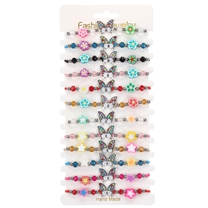 Detailed display of 12 butterfly beaded bracelets with rhinestones on a white card
