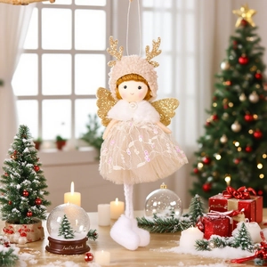 Christmas tree angel ornament with cream knit hat, gold antlers, and sequined lace skirt