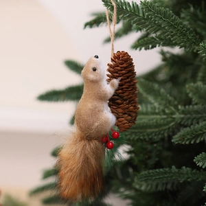 Detailed view of foam squirrel ornament with fluffy tail and natural pine cone decoration
