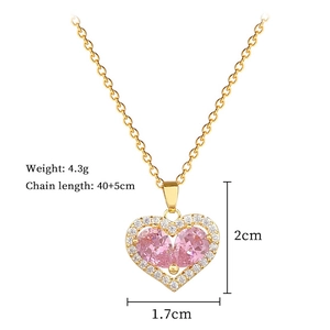 Detail of pink crystal heart pendant with gold chain dimensions and weight info