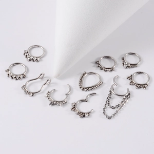 10pcs silver stainless steel nose rings set with crystals, spikes and chain accessory