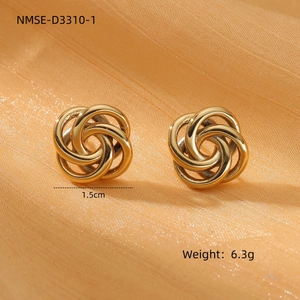 Detailed view of 1.5cm gold twisted knot earrings on orange silk, weight 6.3g