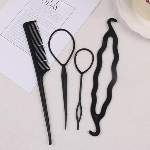 Detail view of 4pcs black hair styling tool set with topsy tail and comb on beige fabric