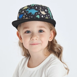 Detailed view of kids hip-hop baseball cap featuring colorful cartoon dinosaur patterns