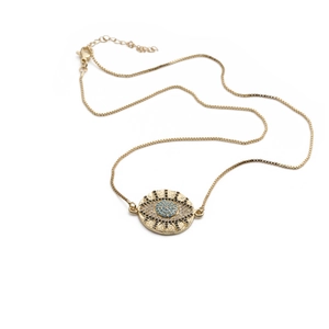 Gold-plated Evil Eye pendant necklace with blue and black crystals on white background