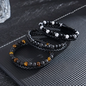 Men's leather braided bracelet with tiger eye beads and a magnetic clasp closure