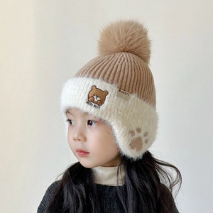 Warm winter knit hat for kids with bear patches and ear protection in khaki color
