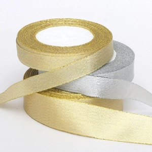 Rolls of metallic gold and silver glitter ribbons for Christmas DIY decoration crafts