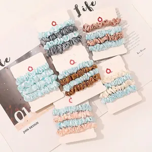 Satin scrunchie set with six Morandi color groups on display cards for women