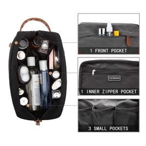 Detail view of a canvas toiletry bag with front pocket and inner zipper compartments.