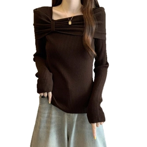 Slim fit off-shoulder brown ribbed knit sweater with large bow detail and long sleeves