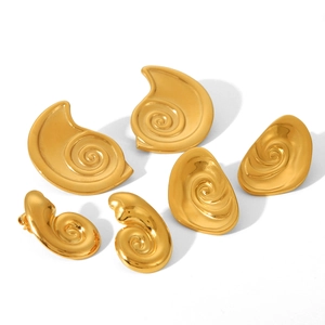 Three pairs of golden 18K titanium steel snail shell earrings with spiral textures