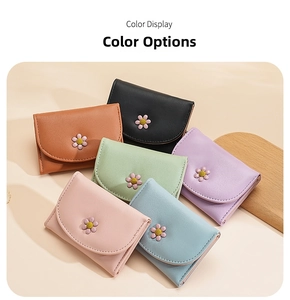 Color display of trifold wallets featuring 3D daisy flower design in six pastel shades