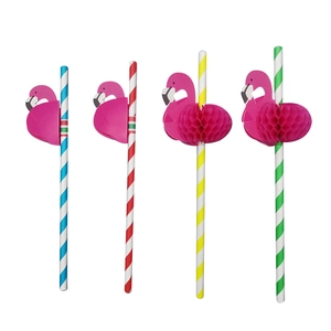 Striped paper straws with pink flamingo honeycomb and card decorations for cocktails