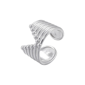Detail of silver multi-layered ear cuff with decorative bead lines and fluid texture