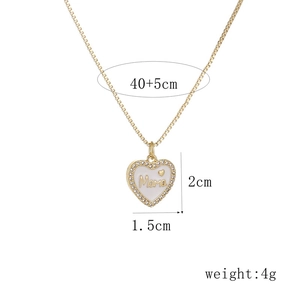Golden heart MAMA pendant necklace with white enamel and rhinestones on gold chain