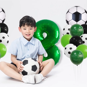 Detail of green number 8 foil balloon with soccer printed latex balloons for party decor