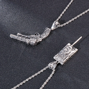 Vintage punk style titanium steel necklace with detailed tank and handgun pendants