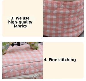 Detailed macro view of pink checkered quilted fabric and high-quality zipper on cosmetic bag