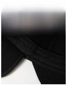 Detail of moisture-wicking sweatband inside black winter hat with reinforced stitching