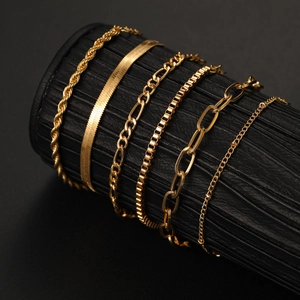 Bohemian gold chain bracelet set with snake, figaro, and paperclip links for women