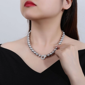 Elegant grey pearl necklace with a silver diamond-encrusted clasp for a luxury style