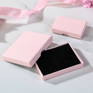 Detail of pink drawer-style jewelry gift box with premium black sponge foam padding