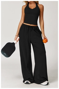 Detail of high-waisted wide leg drawstring joggers with moisture-wicking fabric