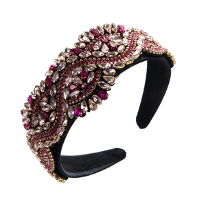 Detail shot showing intricate rhinestone and bead patterns on Baroque velvet headband