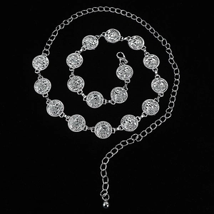 Detail of silver metal chain belt with vintage coin charms and adjustable ball pendant