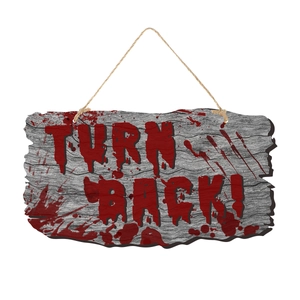Détail d'un panneau en bois taché de sang Turn Back pour décor de fête d'Halloween effrayant