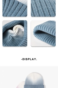 Macro detail of blue and white gradient knit beanie showing fabric texture and care label