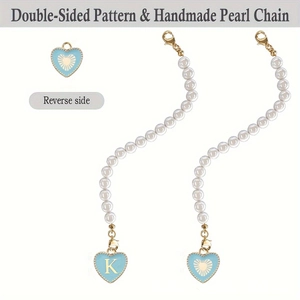 Detail of handmade pearl chain with double-sided blue heart pendant and letter K