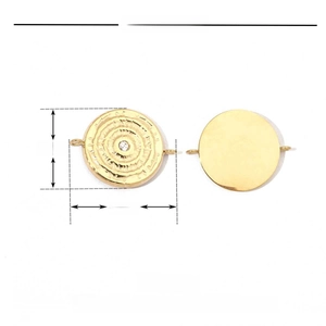 Detail of 15mm gold round pendant with spiral texture and rhinestone in stainless steel