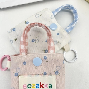 Floral canvas mini earphone case with fabric handle and snap closure detail