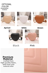 Detailed view of heart-shaped crossbody bag featuring quilted V-stitch and diverse colors
