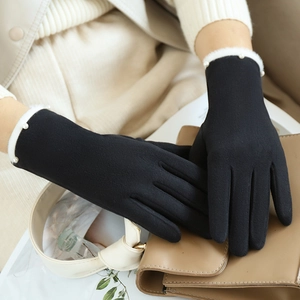 Women's black thermal gloves with plush trim and pearl detail, featuring touchscreen tips
