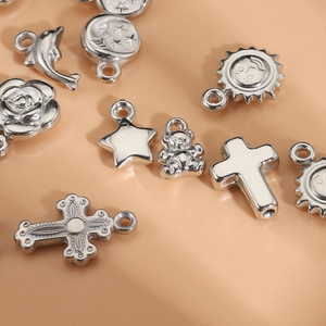 Set di ciondoli in CCB argento con stelle, orsi e croci per creazione gioielli fai da te