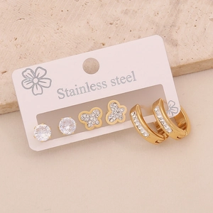 Detail of 6-piece gold stainless steel earring set with butterflies and crystals