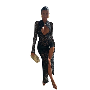 Detail of black lace dress featuring chest cutout and high slit design with metal clasp