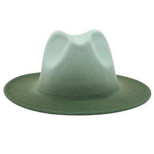 Detailed close-up of wool felt fedora with green gradient from mint to forest green