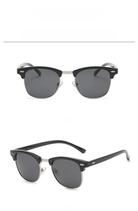 Detaillierte Front- und Seitenansicht der klassischen schwarz-silbernen Halbrand-Sonnenbrille