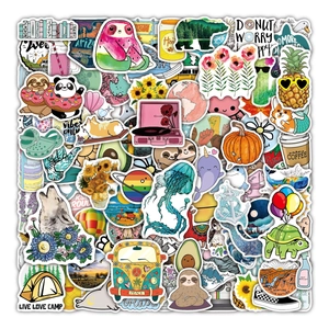 Flat lay of 100 colorful PVC waterproof VSCO aesthetic stickers with nature and animal designs