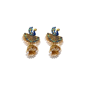 Vintage gold Jhumka earrings with peacock enamel design and delicate pearl tassels