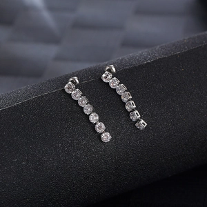 Sparkling tassel drop earrings with round clear gemstones on a titanium steel base