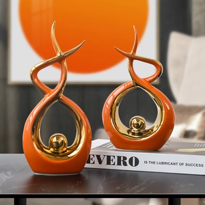 Modern orange abstract ceramic sculptures with gold sphere for home and office decor