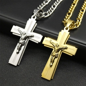 Détails de pendentifs crucifix en acier inoxydable doré et argenté avec relief de Jésus