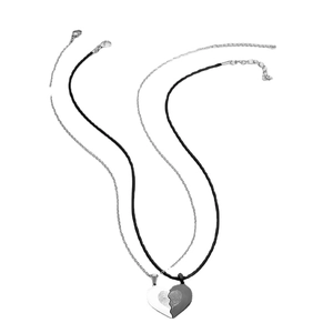 Minimalist heart-shaped coupling necklaces for couples in black and silver finishes